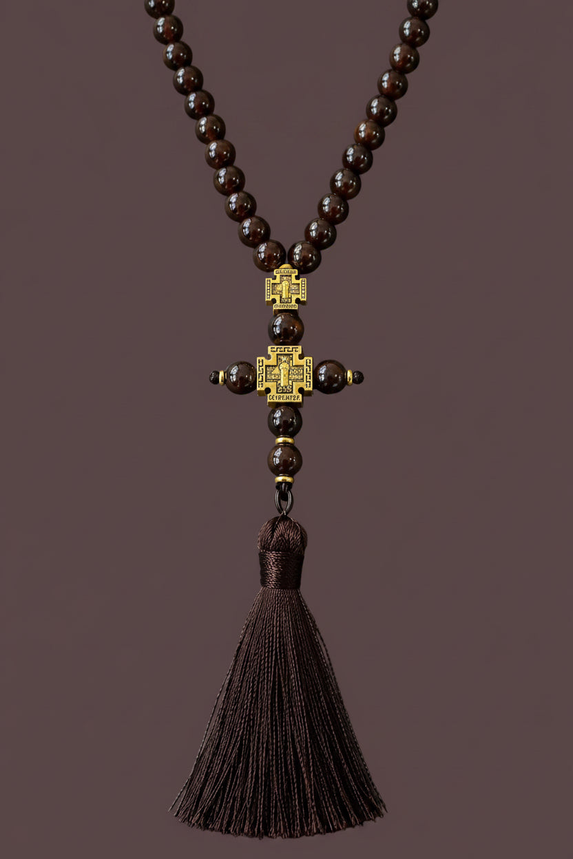 Brown prayer beads tassel detail