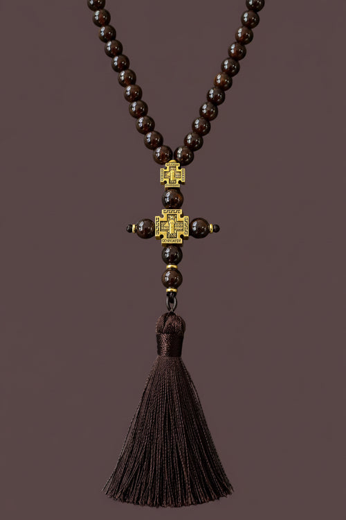 Brown prayer beads tassel detail