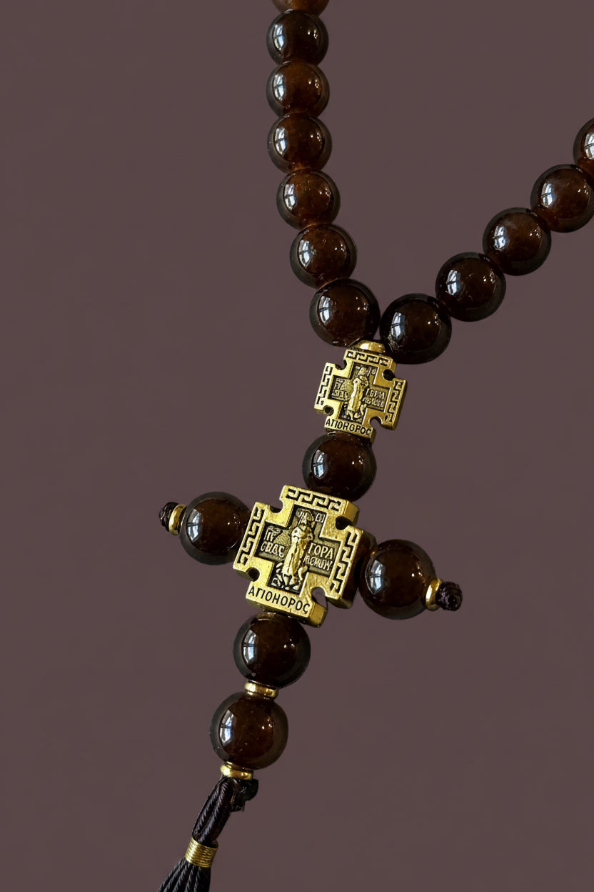 Brown prayer beads cross detail